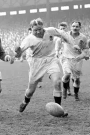 RUGBY UNION OLD PHOTO Englands Squire Wilkins Kicks The Ball 1953