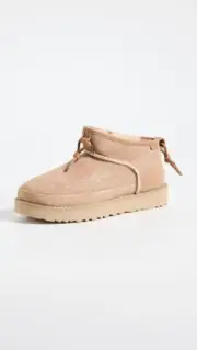 UGG Women's Ultra Mini Crafted Regenerate Fashion Boot, Sand, 9-10