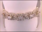 14kt Yellow Gold Womens Baguette Diamond Modern Twist Stackable Band Ring 1