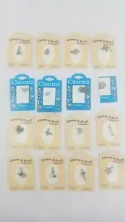 LOT OF 18 PEWTER assorted charms on cards