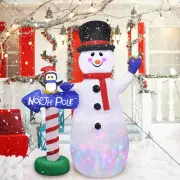 6ft Christmas Inflatable Snowman with Disco Lights w/ Penguin on North Pole Sign