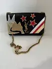 Yves Saint Laurent calfskin rock star patchwork monogram black bag