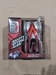 RED TECHNO WALL WHEELS GRAVITY DEFYING RACER CLIMBS WALLS