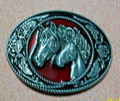 belt buckle two horses heads