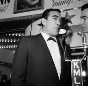 Actor Anthony Quinn is interviewed before the premiere of Wild is - 1957 Photo