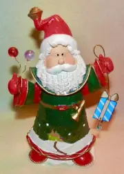 SANTA CLAUSE DRESSED IN GREEN WITH A PRESENT ** CUTE ** 7 INCHES TALL **