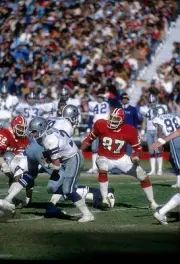 Running back Scott Laidlaw Dallas Cowboys carries the ball v the - 1976 Photo