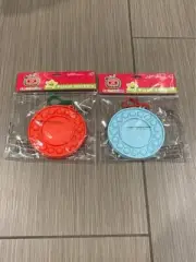 2 Cocomelon fidget poppers keychain kids toys, backpack accessories