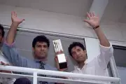 Pakistan bowlers Waqar Younis and Wasim Akram holding the tro- Cricket Photo 1