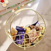 Ghasitaram Gifts Rakhi Gifts for Brothers Half Moon Metal Basket of Bites, Chikki and Cookies with 2 Green Beads Rakhis