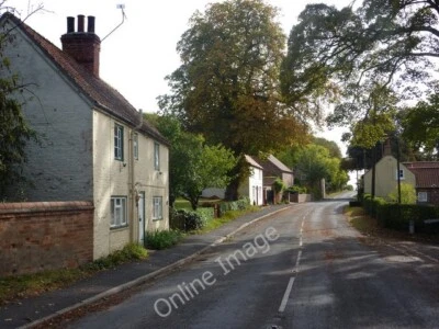 Photo 6x4 Road through Saxby All Saints Looking southeast past the juncti c2009