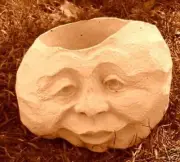 Latex rock face planter with plastic backup for easy casting 8.5"W x 6"H