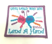 PATCH GSA Girl Scouts GSHG Early Bird 2011 Lend A Hand Taylor Purple Prints