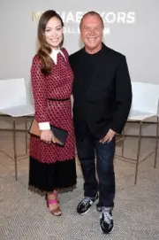 Olivia Wilde designer Michael Kors pose backstage at the Michael K - Old Photo 5