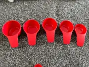 Tupperware Measuring Cups Set of 5 in Embossed Measurements Red New