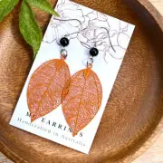 Orange Metal Leaf Dangle Earrings, Black Glass Beads and Leaf Charms