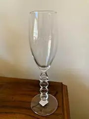 Glass champagne flute millenium year 2000 with Omega logo