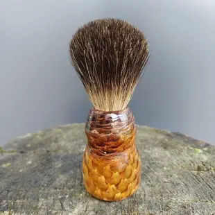 Black badger shaving brush with handmade handle from fir-cone and resin.