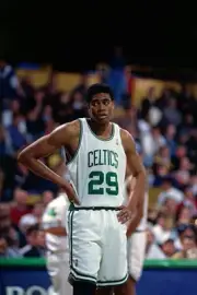 Pervis Ellison Boston Celtics looks on v Boston Celtics in 1995 at- Old Photo
