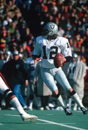 Quarterback Ken Stabler Oakland Raiders drops back to pass v the - 1976 Photo 2