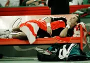 Patrick Rafter of Australia lies down for a rest during the Compaq- Old Photo