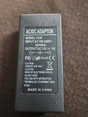 AC/DC ADAPTOR SWITCHING POWER SUPPLY 1230 12V 3A A148-1 NEW INDOOR USE
