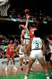Larry Bird Boston celtics goes up for a rebound v Mark West Clevel- Old Photo