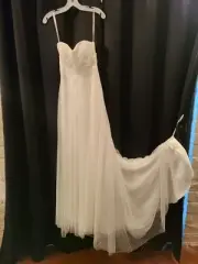 David's bridal wedding dress. New with tags. Never worn size 4