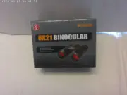 Binoculars 8X21 red lens. New (Sentry)