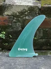 10.5 " Logger longboard center fin, green colour Pro Glass, machined finish.
