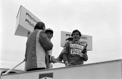 Ayrton Senna 1st the podium with Martin Brundle 2nd Davy Jones 3r- 1983 Photo 2
