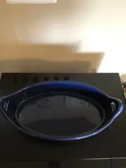 crate and barrel dark blue oval casserole with handles 14” x 7.25” Portugal, new