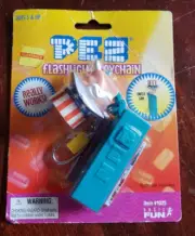PEZ Uncle Sam Flashlight Keychain, 2003 and PEZ Psychedelic Eye. Free ship