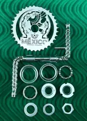 4 1/2" QUADRUPLE TWIST 1 PIECE CHROME BICYCLE CRANK W/MEXICO TEAM SPROCKET & B.B