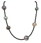 Cultured Tahitian Black Pearl and Black Spinal Faceted Beads 28 Inch Necklace.