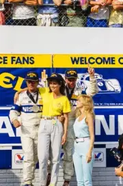 John Morton and Geoff Brabham celebrate on the podium during the R- Old Photo