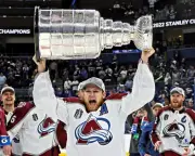 Nathan MacKinnon Avalanche Unsigned 2022 Stanley Cup Champs Raising Cup Photo