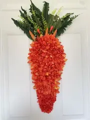 Orange Hanging Carrot Decorated Wreath with Orange Flower Blooms, Leafy Greens,