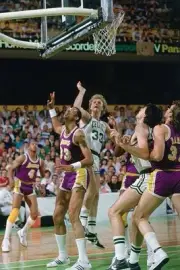 Larry Bird Boston Celtics puts up a shot v Kareem Abdul Jabbar Los- Old Photo