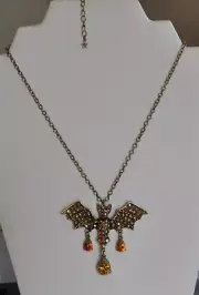 KIRKS FOLLY COSMIC BAT QUEEN NECKLACE IN BRASS TONE