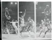 Wilt Chamberlain Making a Basket 1955 Photo - Demonstrating in his first court a