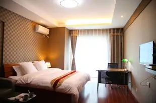 怡家酒店式公寓(大連星海大觀店)Yijia Hotel Apartment Dalian (Xinghai Daguan)