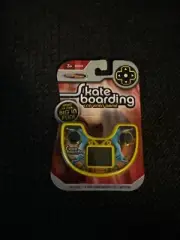 (B7) Techno Source Hand Held Skateboarding Game Electronic Game NEW