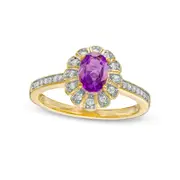 Oval Amethyst and 0.17 CT. T.W. Natural Diamond Sun Frame Ring in Solid 10K Yellow Gold