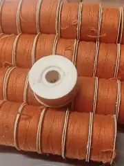 Prewound ARCO Bobbins Size G #24, orange color, 67pcs,NOS out of box.