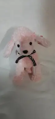 Retired Brigitte Beanie Babie with tag errors.