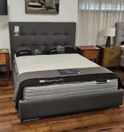 Leeds custom upholstered bed with deluxe base - discounted display model