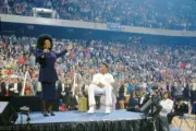 Philadelphia 76ers Julius Erving sits while celebrity singer Patti- Old Photo