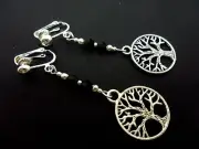 A PAIR OF TIBETAN SILVER TREE OF LIFE THEMED CLIP ON EARRINGS. NEW.