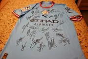 2023 MANCHESTER CITY TRIPLE CHAMPIONS HAND SIGNED SHIRT/JERSEY + COA.